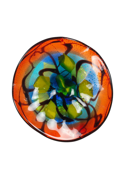 Colorful glass dish with a floral pattern on a white background